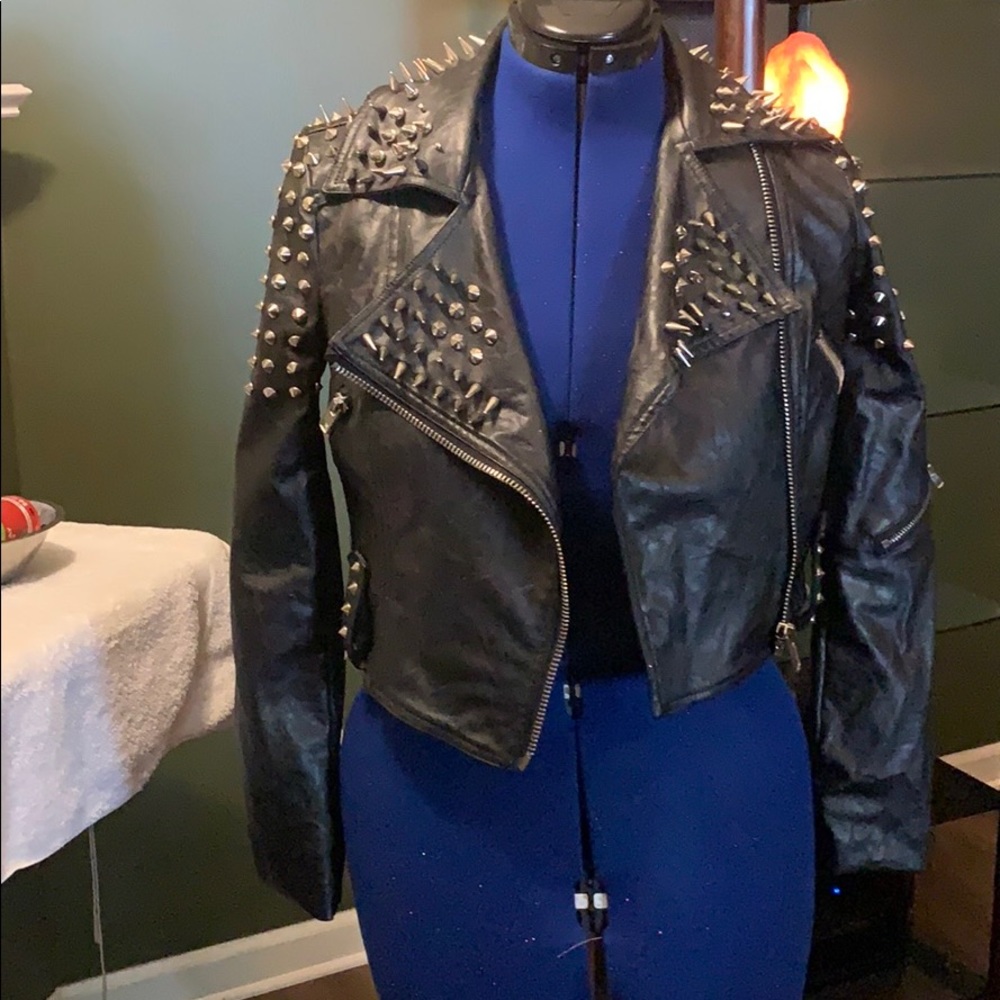 Black leather biker jacket with spikes